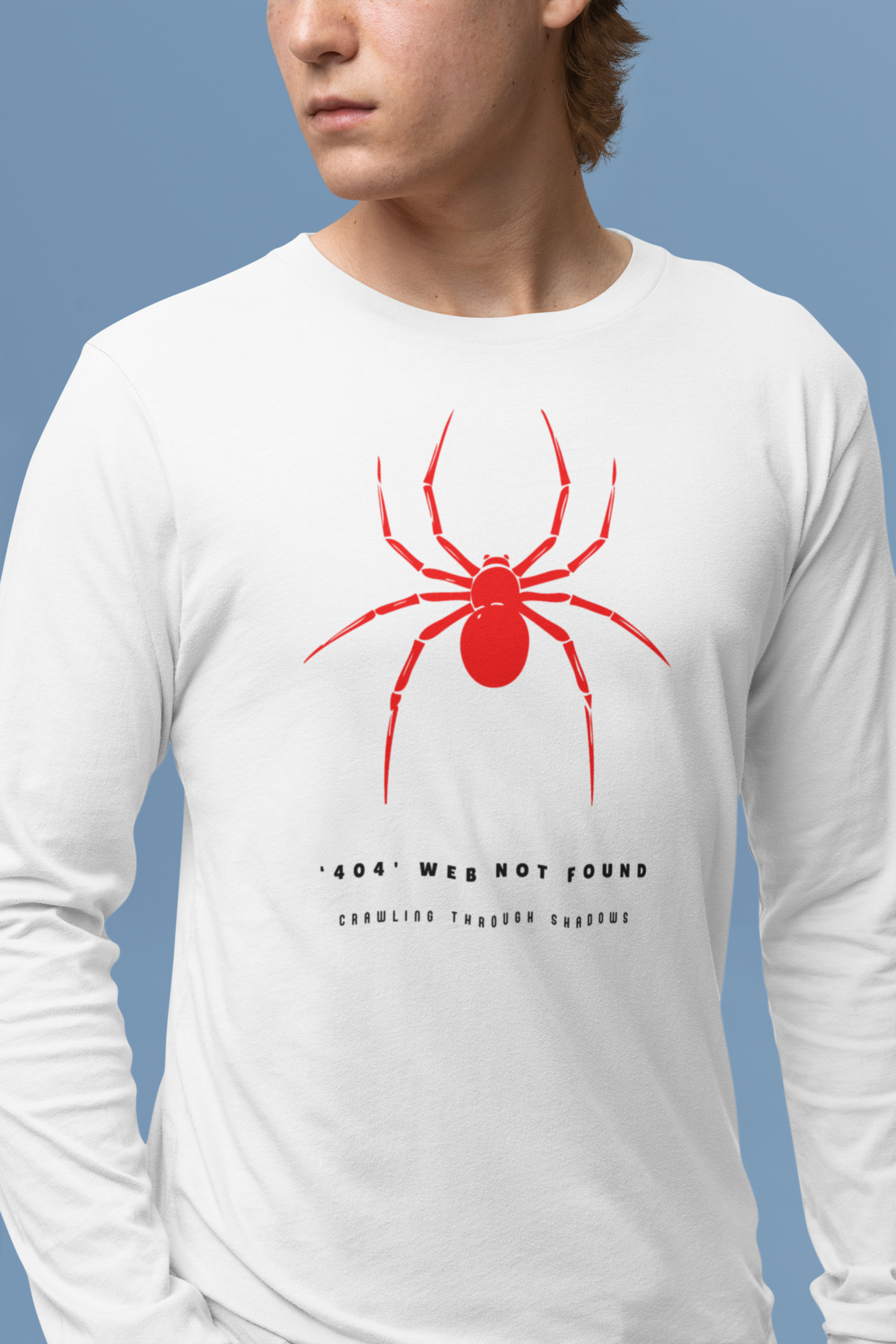 White long-sleeve shirt with a red spider graphic 